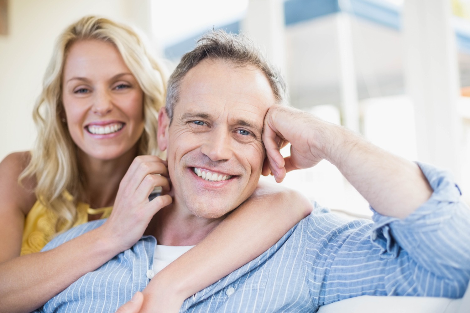 Couple smiling with great service from top Irving Orthodontist.